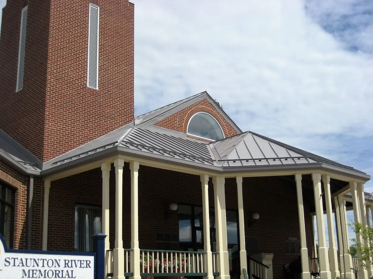Skilled roofing craftsmen working on a residential roof in Reminderville